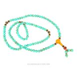 A Turquoise Bead Necklace.