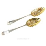 a pair Antique Georgian Sterling Silver Berry Tablespoons.