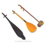 Three Ethnographic String Instruments.