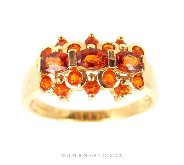 A Gold Madeira Citrine Dress Ring.