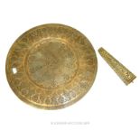 A LATE 19TH CENTURY BRASS ISLAMIC CHARGER.