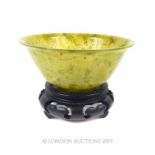 A Small And Finely Worked jade Bowl With Stand