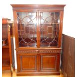 A MAHOGANY DISPLAY CABINET.