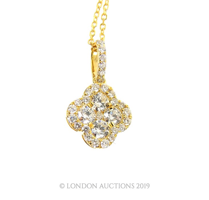 An 18 carat yellow gold Diamond set pendant necklace in the form of a four leaf clover 70 points