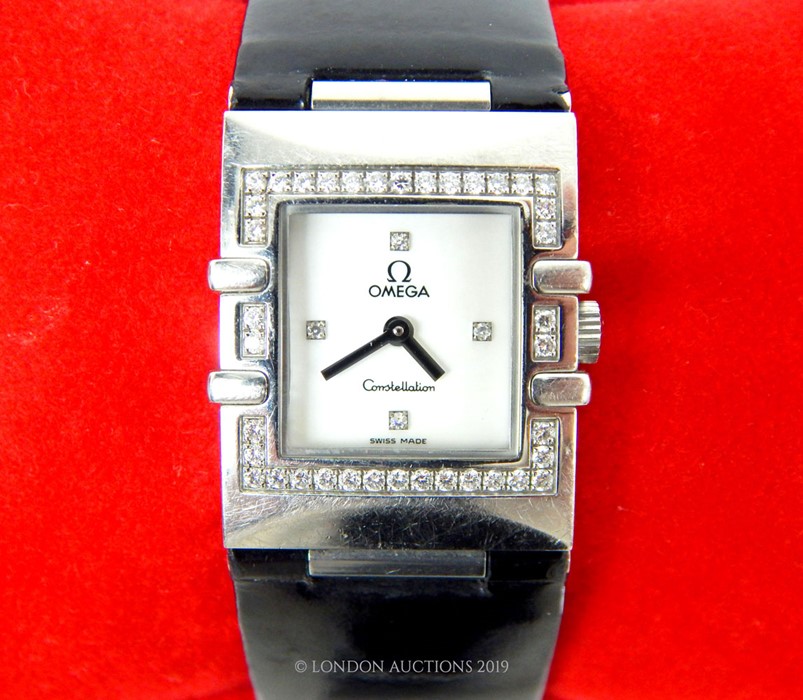 A Cased And Boxed Ladies Omega Constellation With Steel Case And Diamonds