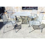 A Gray Painted Steel Garden Table With Four Chairs.