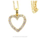 An 18 Carat Yellow Gold Diamond Heart Shaped Pendant Necklace.