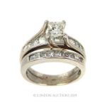 A 14 Carat White Gold Double Ring.