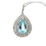 An 18 Carat White Gold Pear Shaped Aquamarine And Diamond Pendant Necklace.