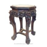 A 19th CENTURY CHINESE CARVED HARDWOOD AND MARBLE TOP JARDINIERE STAND.