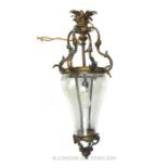 A LARGE DECORATIVE 19TH CENTURY BRONZE AND GLASS LANTERN.