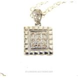 An 18 Carat White Gold Pendant Necklace.