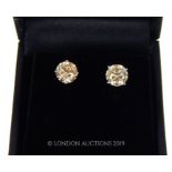 A Pair Of White Gold Substantial Diamond Stud Earrings.