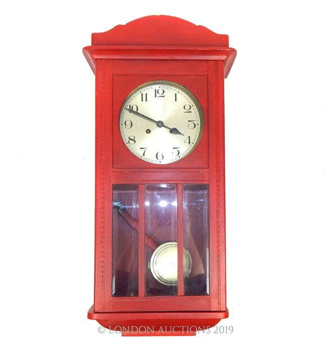 A Red Victorian Wall clock.