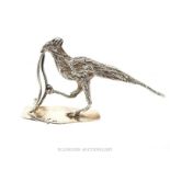 A Britannia Silver Desk Ornament Depicting A Game Bird Eating A Snake