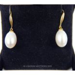 A Pair Of South Sea White Pearl Drop Earrings.