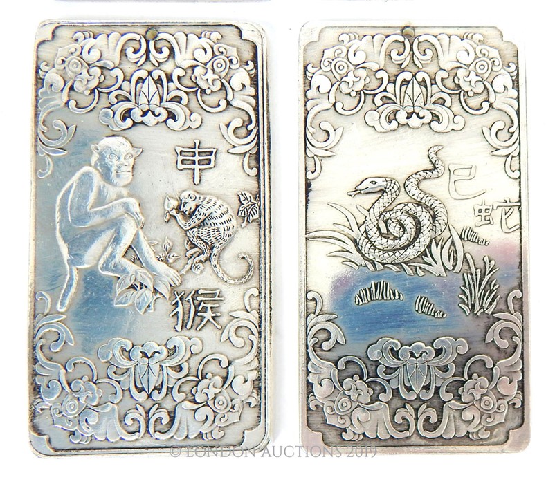 A Set of Twelve White Metal Year Symbols. - Image 3 of 5