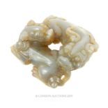 A Chinese Late Qing Period Pale Jade Pair Of Pei Yao Mythical Beasts