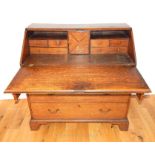 An Early Victorian Oak Writing Bureau.