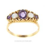 A Vintage 9 Carat Gold Amethyst And Opal Ring.