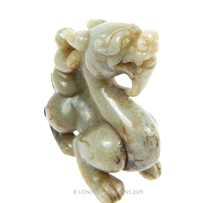 A Chinese Qing Dynasty Celadon Jade Dragon With Figure Riding - Image 5 of 5