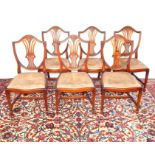 A SET OF SIX MAHOGANY DINGING CHAIRS.