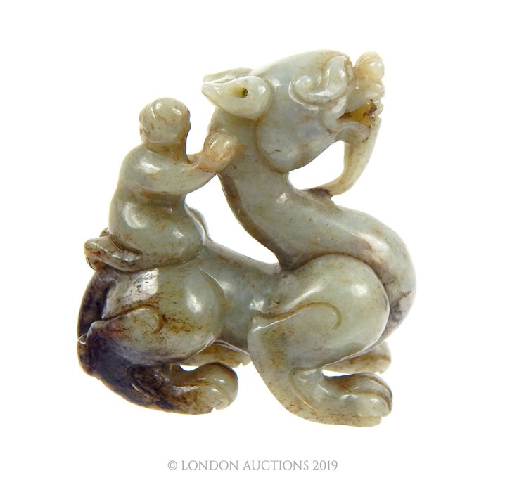 A Chinese Qing Dynasty Celadon Jade Dragon With Figure Riding - Image 4 of 5