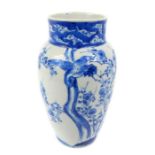 A Chinese Blue And White Vase Depicting Figures And Script