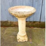 A Cast Concrete Bird Bath With Scroll Decoration on Support.