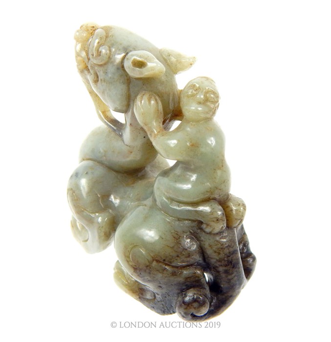 A Chinese Qing Dynasty Celadon Jade Dragon With Figure Riding - Image 3 of 5