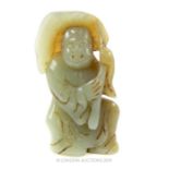 19th Century Chinese Jade Boy Holding A Lotus Leaf