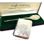 A Cased Sterling Silver Christmas Spoon Alongside A Sterling Silver Covered Prayer Book