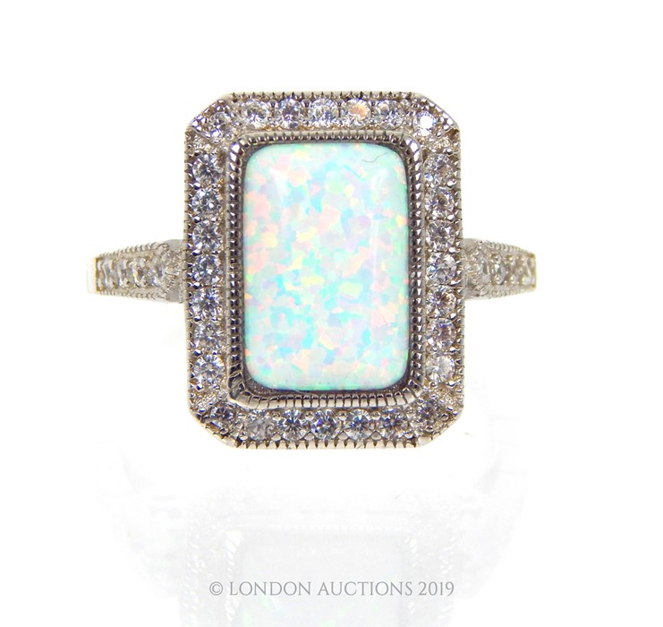 A Silver Cubic Zirconia Opal Panelled Ring. - Image 2 of 3