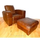 A Leather Armchair And Footstall