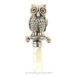 A Silver Owl Shaped Babies Rattle.