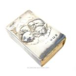 A Sterling Silver Matchbox With Faces Depicting Cherubs