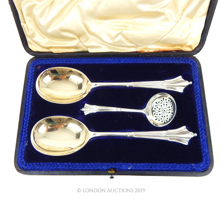 A Cased Sterling Silver Albany Set Of Gilt Lined Serving Spoons And Sifter