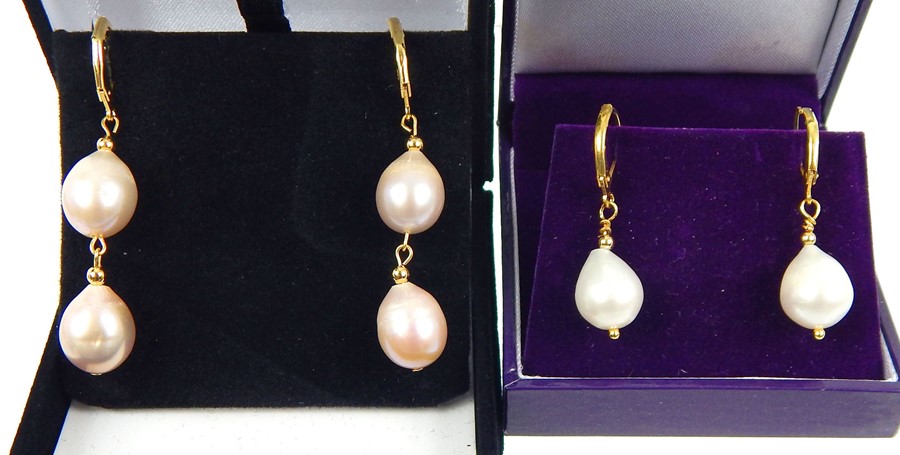 Two Pairs Of Pearl Drop Earrings.