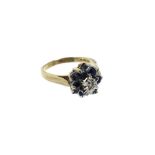 A 9ct Gold Cluster Ring With Dark Sapphire And Diamond