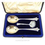 A Cased Sterling Silver Albany Set Of Gilt Lined Serving Spoons And Sifter