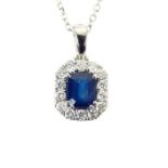 An 18 Carat White Gold Sapphire And Diamond pendant.