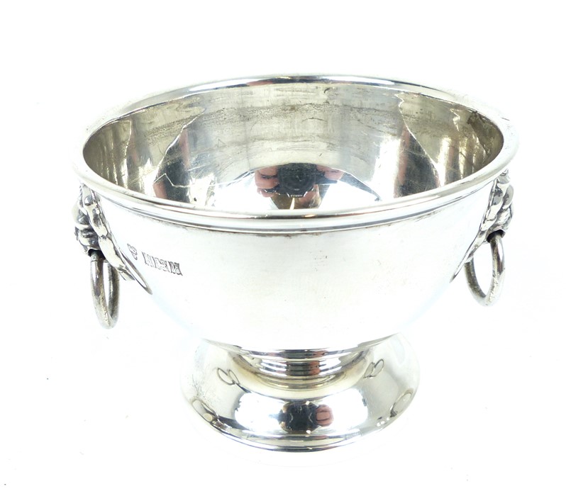 A Small Sterling Silver Bowl With Lions Head Handles