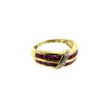 a 9 Carat Gold Ruby And Diamond Dress Ring.