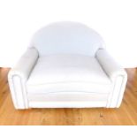 An Upholstered Cream Oversize Arm Chair.