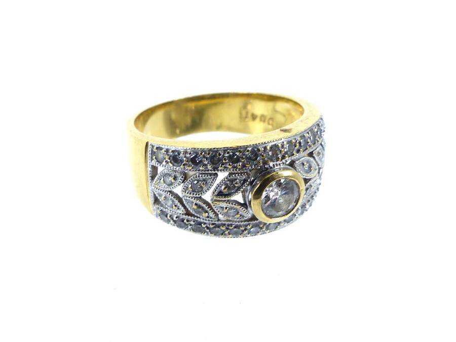 A Large Thick Banded 18ct Gold And Diamond Ring