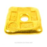 A Chinese Gilt Trading Token.