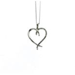 A 9 Carat Gold And Diamond Heart Pendant.