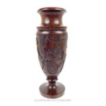 An African Ebony Wooden Vase With Carvings.