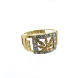 A 9 Carat Yellow And White Gold Greek Key And Leaf Design Ring.