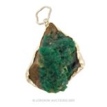 A Raw Uncut Emerald Pendant